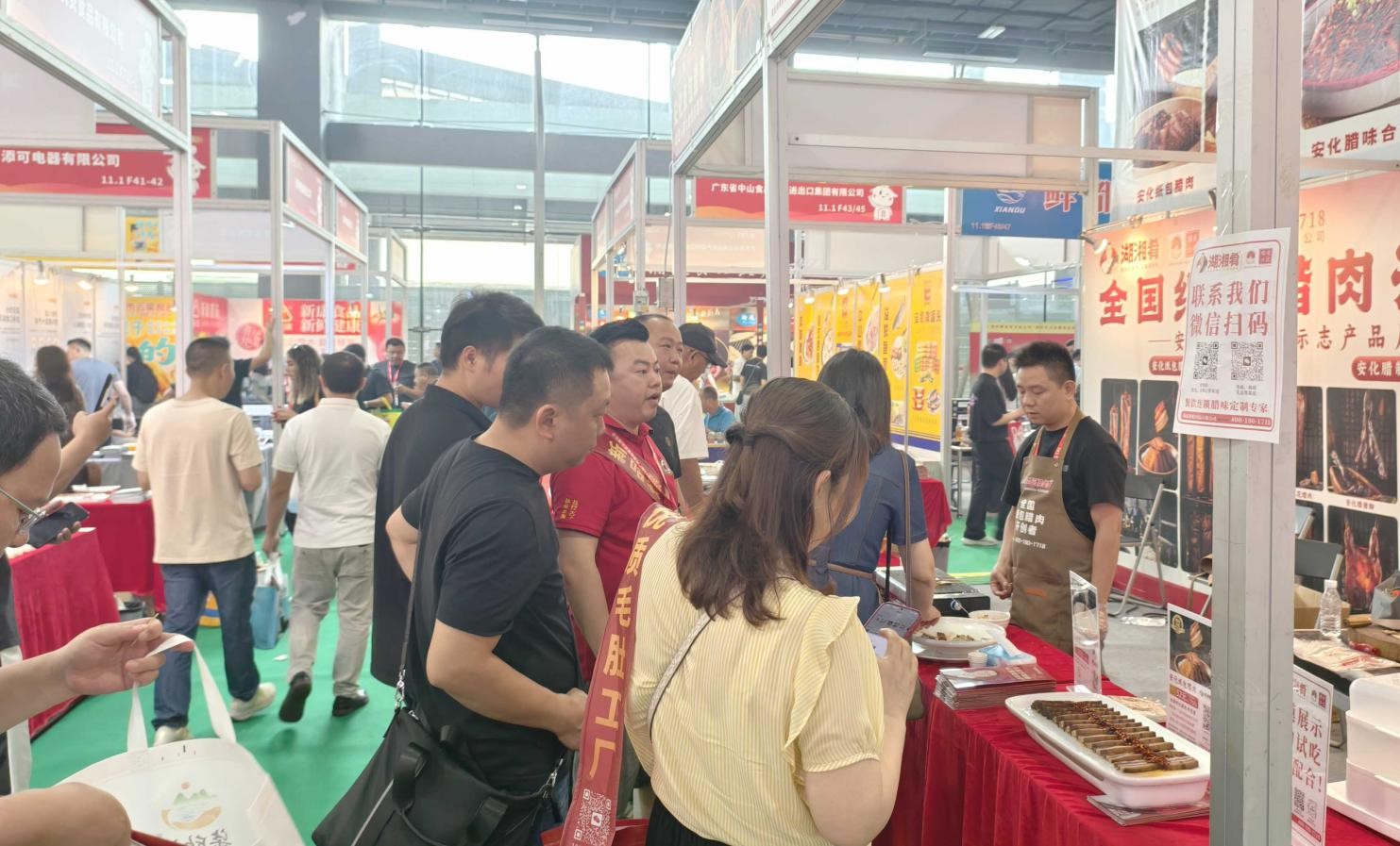 非遗魅力助推湘品出湘｜湖湘肴安化纸包腊肉“香”动2025广州餐博会